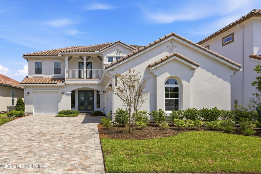 Front exterior of a new home in Tamaya, Jacksonville, FL, highlighting curb appeal (Image 27). Front exterior of a new home in Tamaya, Jacksonville, FL, highlighting curb appeal (Image 27).