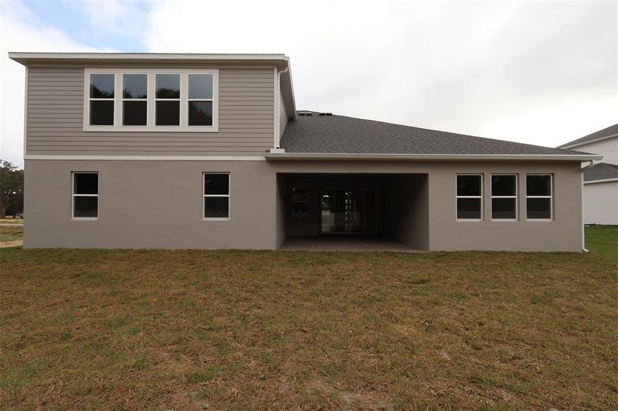 Exterior details and patio area of a home in Willow Run, Apopka (Image 23).