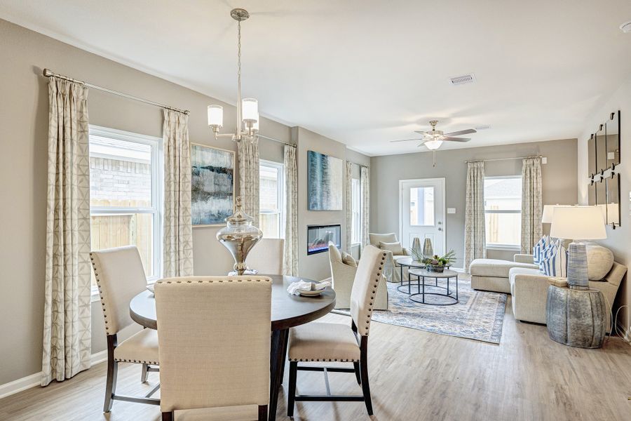 Dining into Family Room. Sample image for illustration; upgrades, options, and colors may vary. Dining into Family Room. Sample image for illustration; upgrades, options, and colors may vary.
