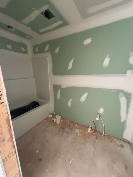 In-progress construction of a new home in White Oaks, The Rock, GA (Image 21).