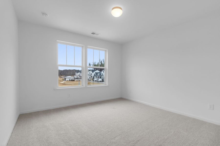 Spacious, unfurnished interior of a new home in Homecoming, Ravenel (Image 28).