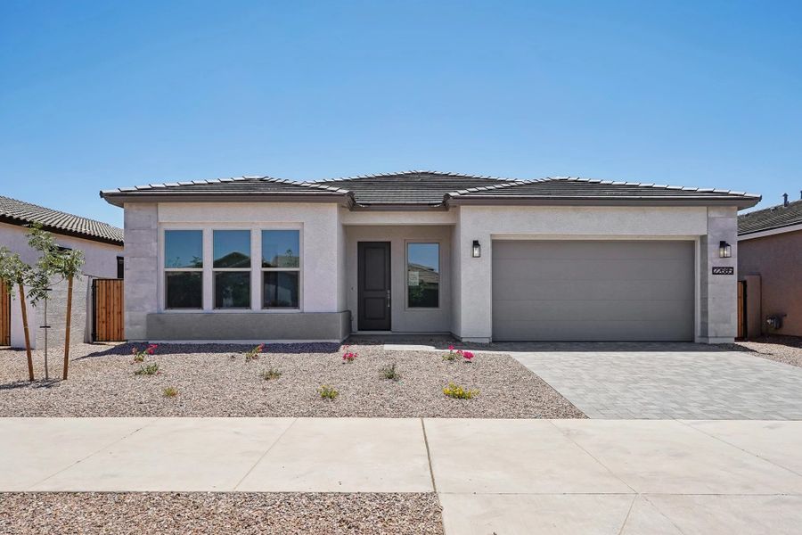 Representative exterior photo of a completed home built from the Topaz by Ashton Woods in Sanctuary at Stonebridge Manor, Waddell, AZ (Image 2). Representative exterior photo of a completed home built from the Topaz by Ashton Woods in Sanctuary at Stonebridge Manor, Waddell, AZ (Image 2).