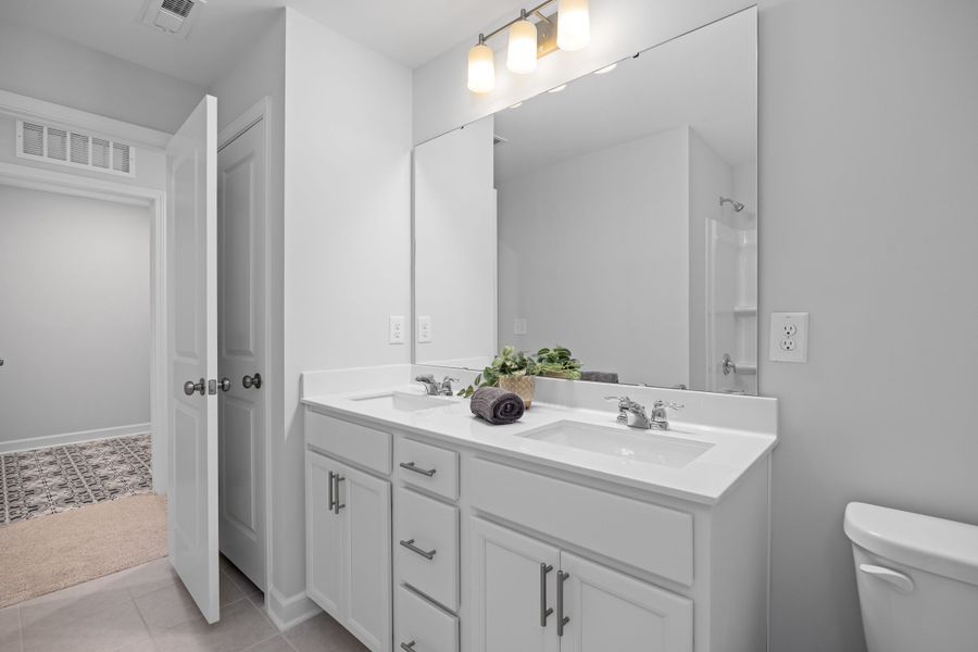 Representative furnished interior of a home built from the The Warren by Davidson Homes LLC in Gregory Village Townhomes, Lillington (Image 25).