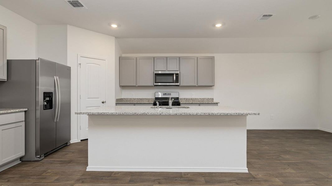 Furnished interior view inside a new home in Watermill, Uhland (Image 4).