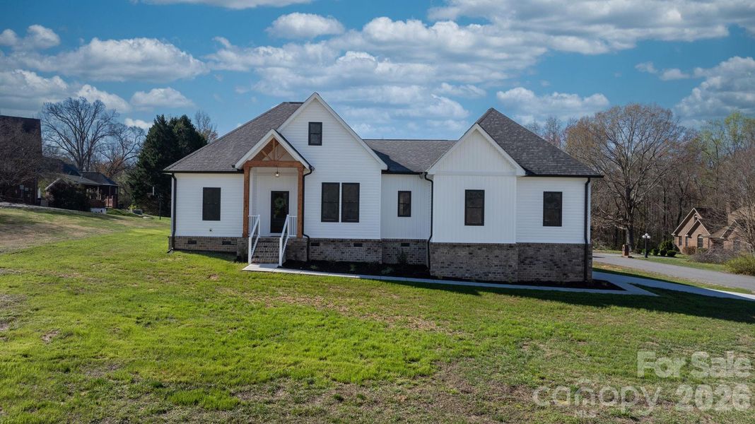Front exterior of a new home in , Conover, NC, highlighting curb appeal (Image 28).
