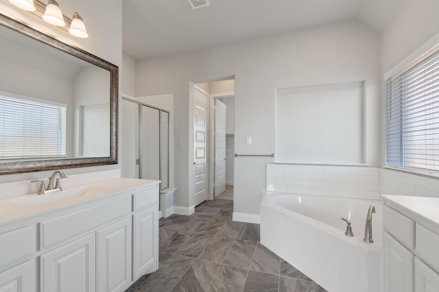 Primary Bathroom | Concept 2623 at The Meadows in Gunter, TX by Landsea Homes