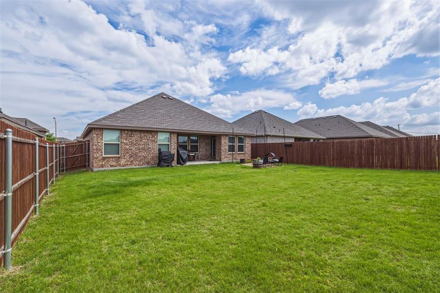 Exterior details and patio area of a home in Stonewyck Farms, Ennis (Image 3).