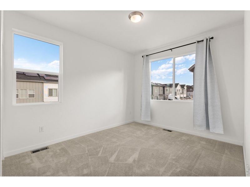 Spacious, unfurnished interior of a new home in Whisper Village, Arvada (Image 20).