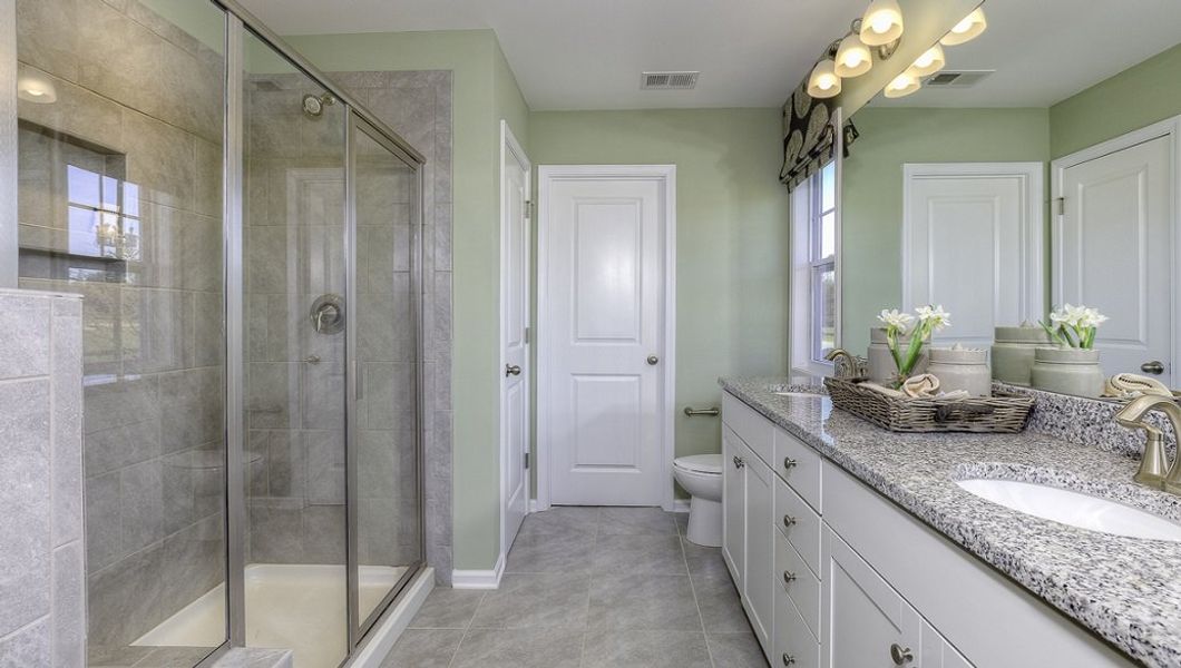 Representative furnished interior of a home built from the Carson by D.R. Horton in Townes at Tap Root Farms, Fletcher (Image 25).