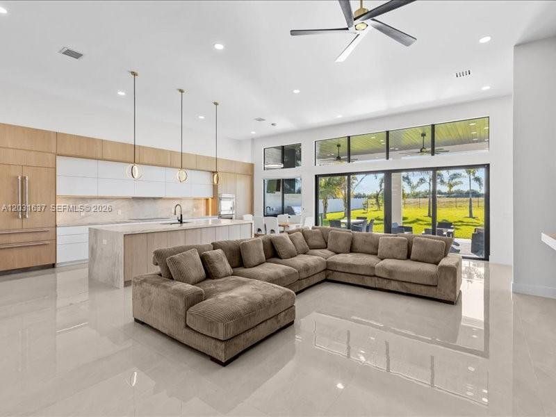 Furnished interior view inside a new home in , Port St. Lucie (Image 12).