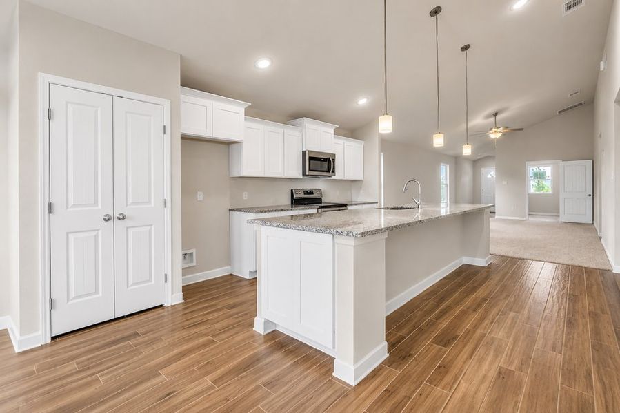 Representative furnished interior of a home built from the Canary 1730 TR 3CG by Saratoga Homes in Turnbo Ranch, Killeen (Image 4).