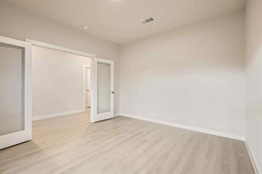 Spacious, unfurnished interior of a new home in Prestige Collection at Overland Grove, Forney (Image 19).