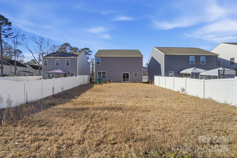 Exterior details and patio area of a home in , Charlotte (Image 4). Exterior details and patio area of a home in , Charlotte (Image 4).