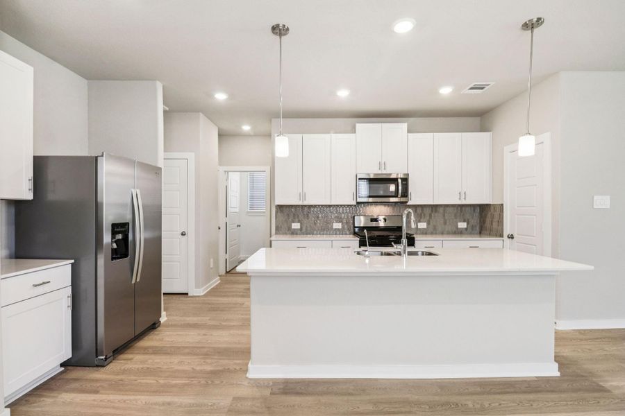 Photo is not of the actual home, but is an inspirational photo of builder’s model home and may depict options, furnishings, and/or decorator features that are not included