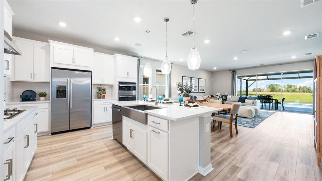 Furnished interior view inside a new home in Coasterra Community Group Page, Palmetto (Image 6).