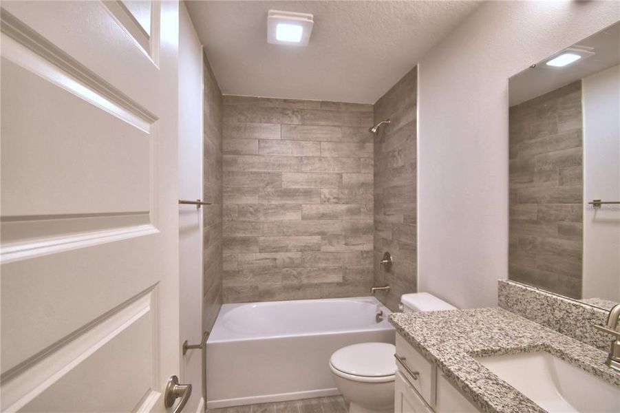 Furnished interior view inside a new home in Lake Juliana Estates, Auburndale (Image 9).