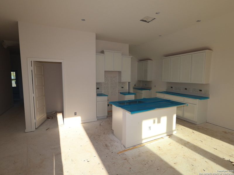 In-progress construction of a new home in Agave, San Antonio, TX (Image 28).