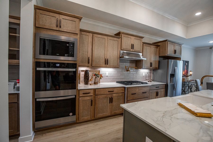 Representative furnished interior of a home built from the Willow by Grant & Co in Manor at Hall Creek, Arlington (Image 109).