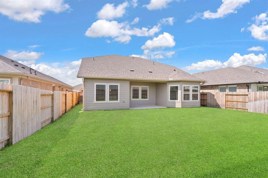 Charming Covered Patio in the Beautiful Backyard offers recessed lighting and a magnificent view of the greenspace with NO back neighbors!