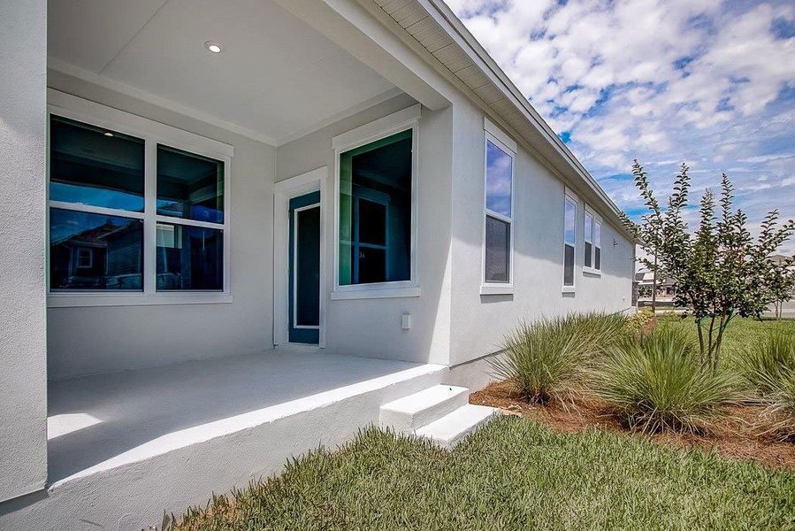 Representative exterior details of a home built from the The Bluefish by David Weekley Homes in Laureate Park at Lake Nona - Garden Series, Orlando (Image 3). Representative exterior details of a home built from the The Bluefish by David Weekley Homes in Laureate Park at Lake Nona - Garden Series, Orlando (Image 3).