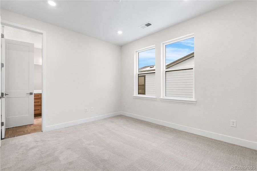 Spacious, unfurnished interior of a new home in Autograph at Lyric, Lone Tree (Image 37).