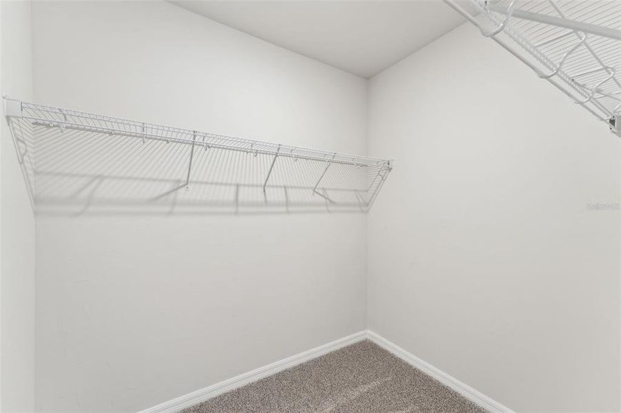 Spacious, unfurnished interior of a new home in Crescent Lakes - Premier Series, Punta Gorda (Image 23).