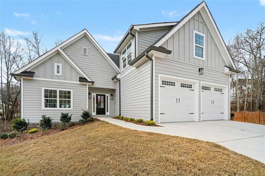 Front exterior of a new home in , Douglasville, GA, highlighting curb appeal (Image 19). Front exterior of a new home in , Douglasville, GA, highlighting curb appeal (Image 19).