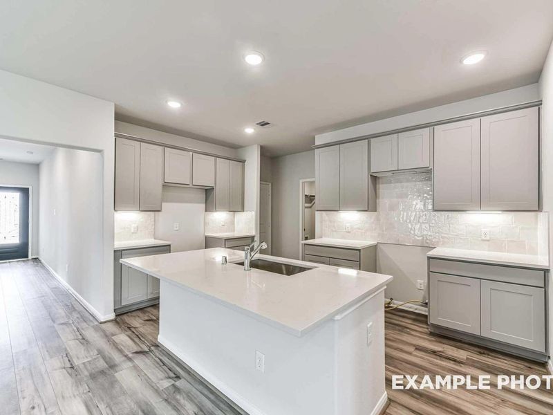 Furnished interior view inside a new home in Sunterra, Katy (Image 6).