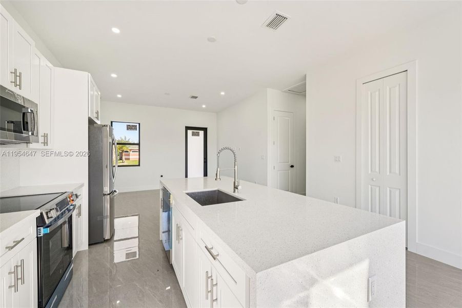 Furnished interior view inside a new home in , Lehigh Acres (Image 5).
