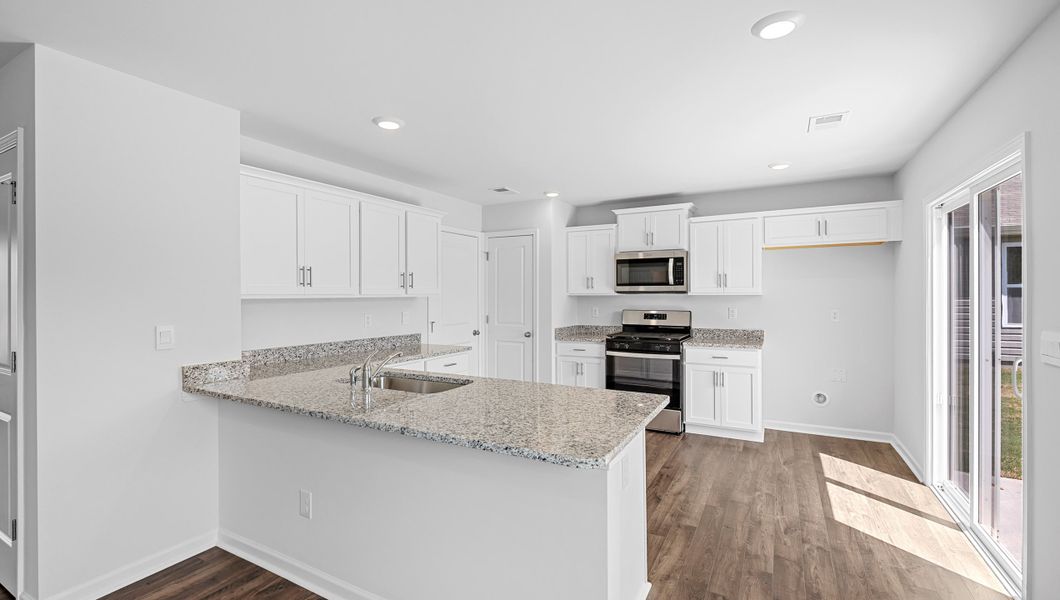 Furnished interior view inside a new home in Harper Ridge, Roebuck (Image 8).