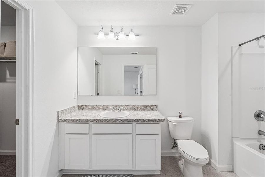 Furnished interior view inside a new home in , St. Cloud (Image 8).