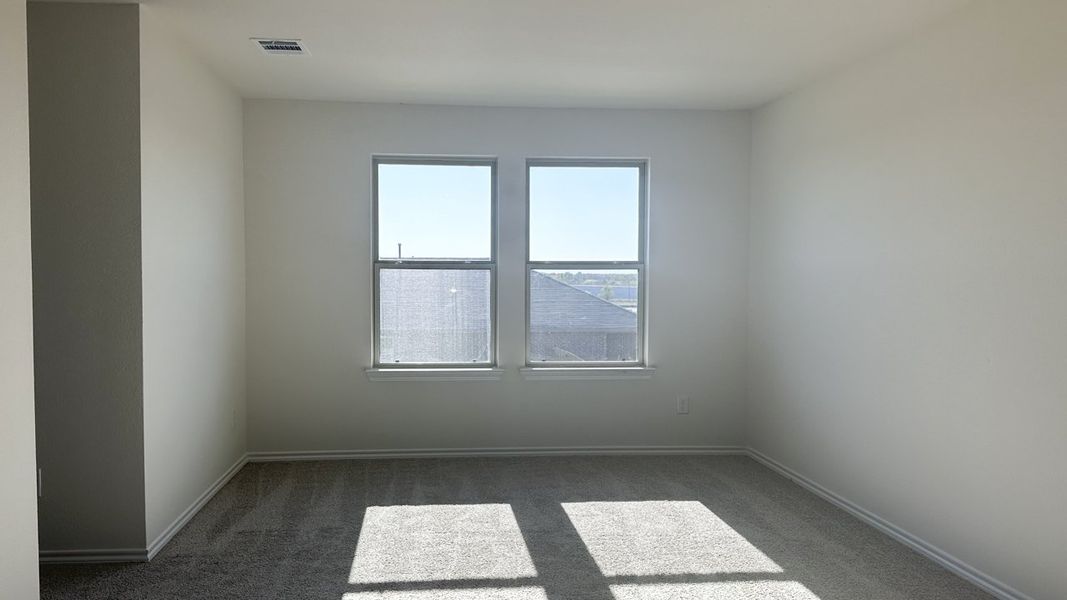 Representative unfurnished interior of a home built from the MIDLAND by D.R. Horton in Northspur, Forney (Image 15).