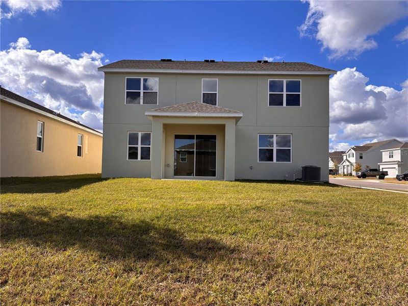 Exterior details and patio area of a home in Trinity Lakes, Groveland (Image 3).