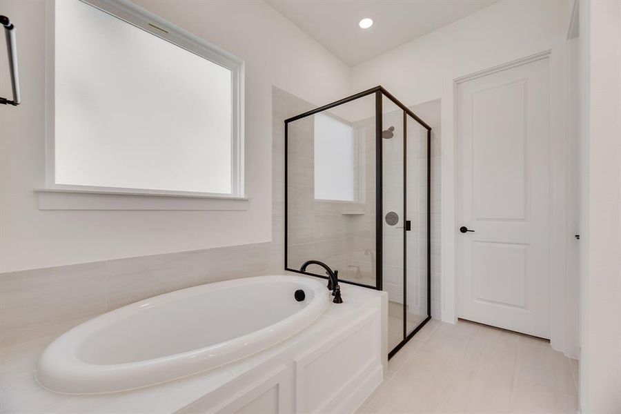 Furnished interior view inside a new home in Light Farms Brenham - 40' Lots, Celina (Image 13).