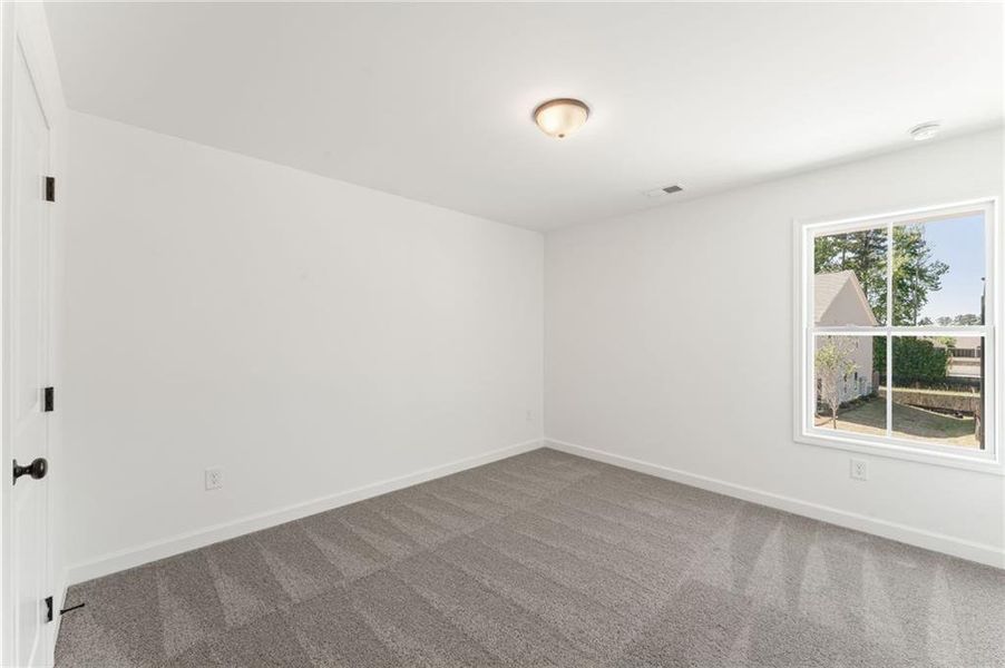 Spacious, unfurnished interior of a new home in Cherokee Township, Acworth (Image 26).