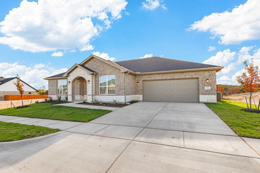 Representative exterior photo of a completed home built from the Garrison I by Cheldan Homes in Stoneview, Glen Rose, TX (Image 26).