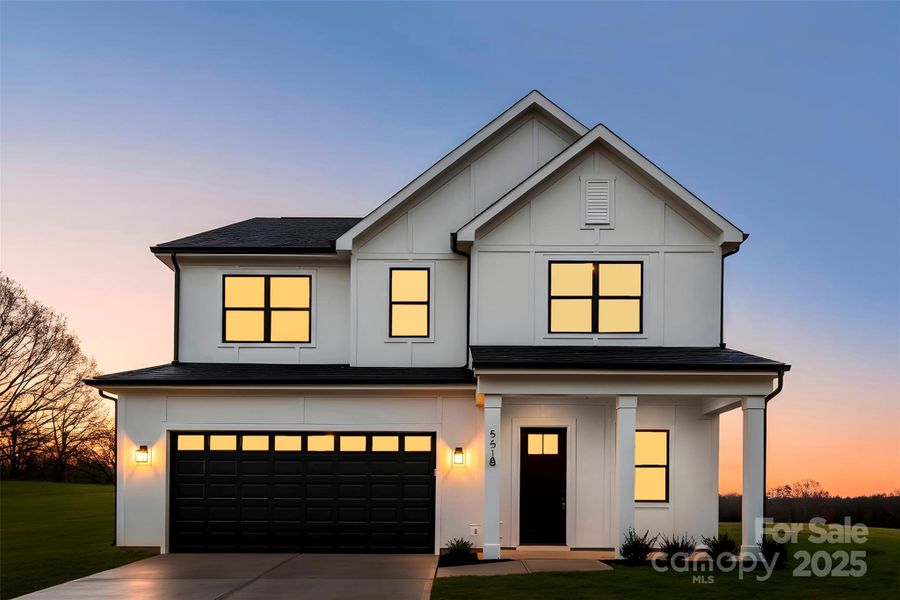 Front exterior of a new home in , Troutman, NC, highlighting curb appeal (Image 2). Front exterior of a new home in , Troutman, NC, highlighting curb appeal (Image 2).
