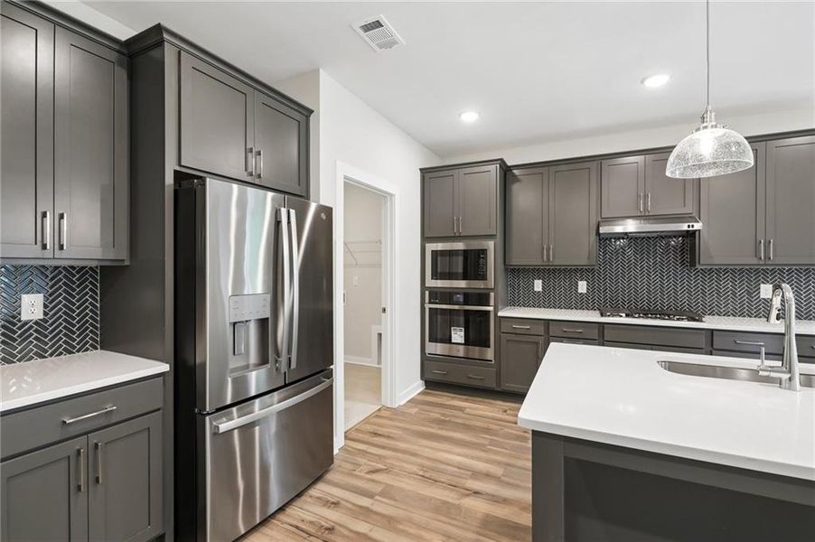 Furnished interior view inside a new home in The Park at Brighton, Locust Grove (Image 8).