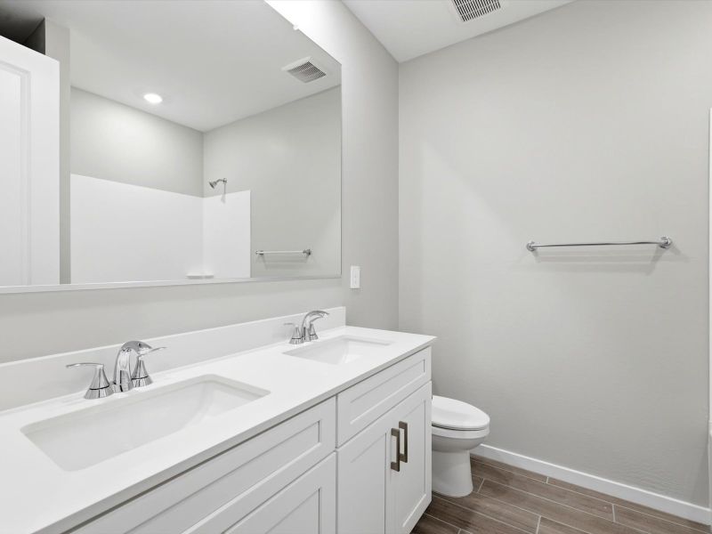 Furnished interior view inside a new home in Legacy Place, Glendale (Image 10). Furnished interior view inside a new home in Legacy Place, Glendale (Image 10).