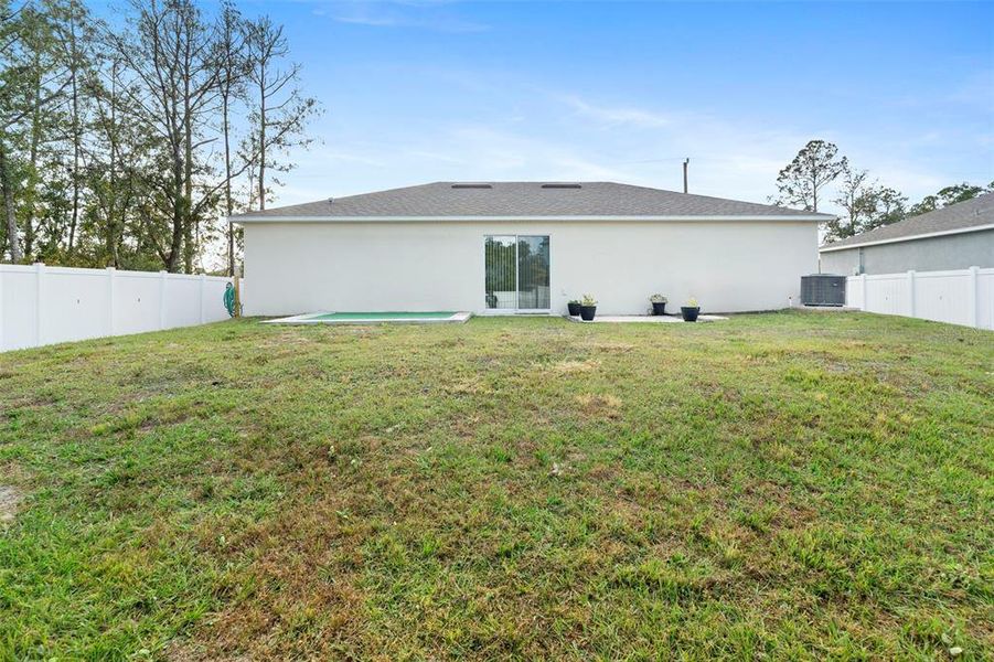 Exterior details and patio area of a home in Poinciana, Poinciana (Image 19).