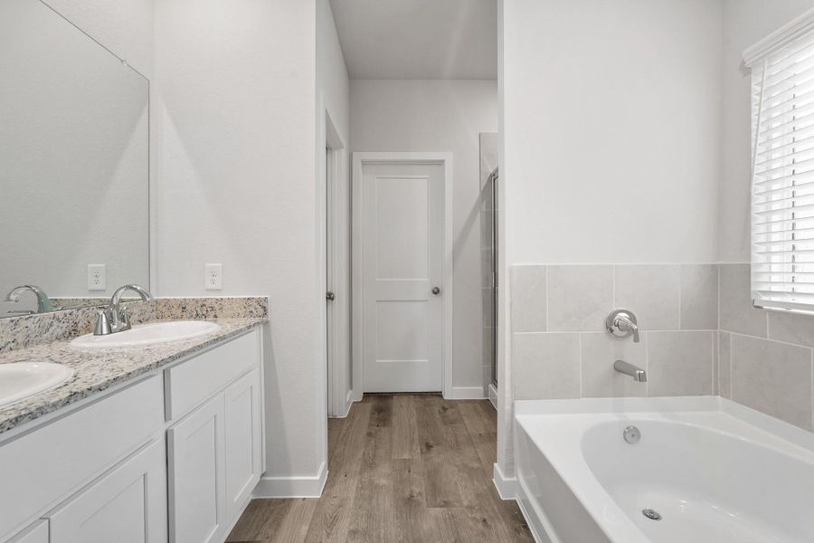 Furnished interior view inside a new home in Lexington Heights, Willis (Image 11).