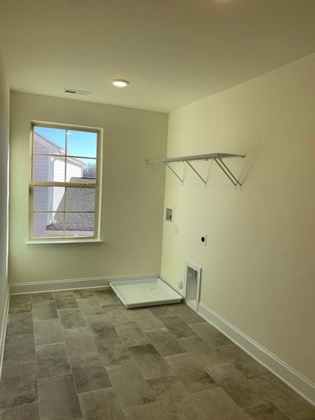 Spacious, unfurnished interior of a new home in Royal Pines, Trinity (Image 30).