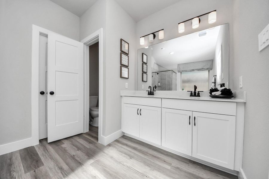 Furnished interior view inside a new home in Sunterra: Landmark Collection, Katy (Image 32).