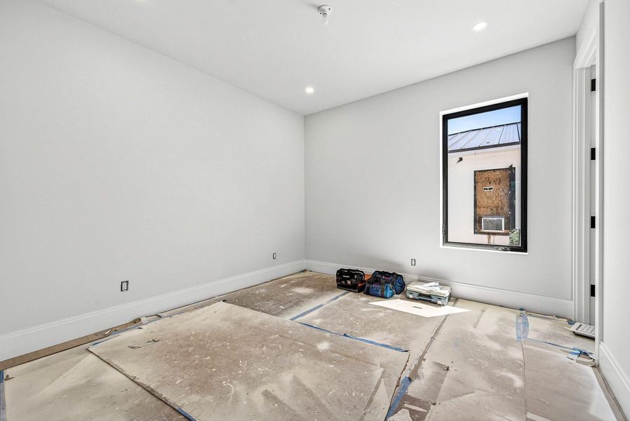 Bedroom 2 - wood floors covered Bedroom 2 - wood floors covered