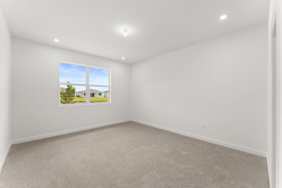 Spacious, unfurnished interior of a new home in Tradition - Cadence, Port St. Lucie (Image 13).