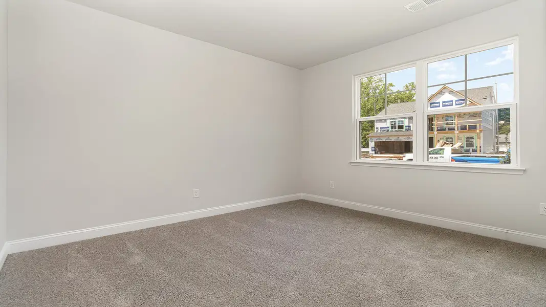 Representative unfurnished interior of a home built from the Darby by D.R. Horton in The Bluffs at Mill Creek, Florence (Image 7).