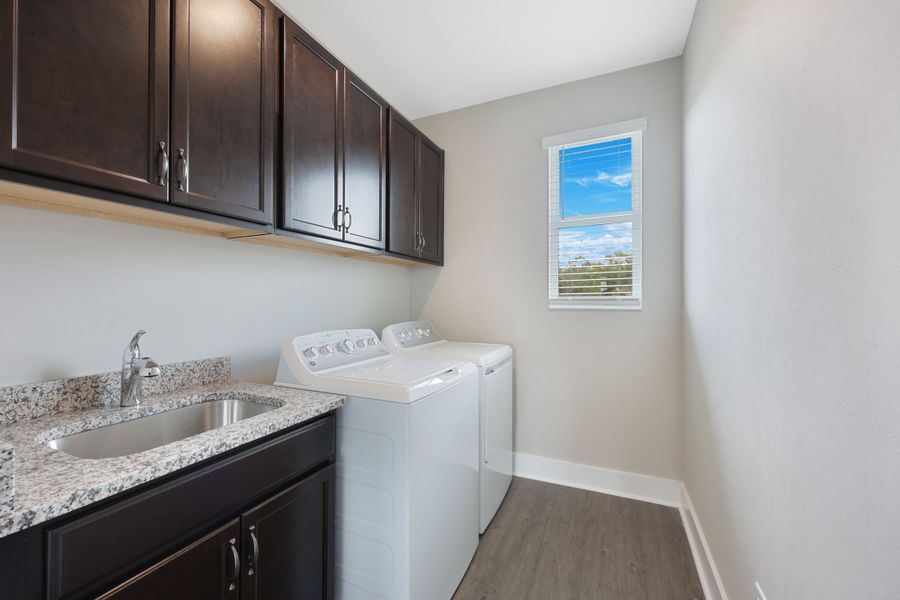 Representative furnished interior of a home built from the Jupiter by William Ryan Homes in The Sanctuary – Royal Collection, Punta Gorda (Image 8).