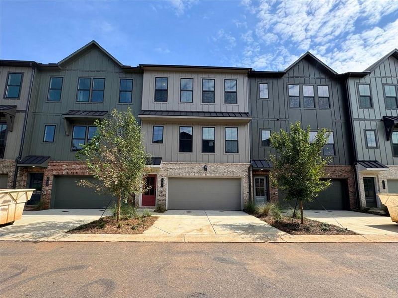 Front exterior of a new home in , Alpharetta, GA, highlighting curb appeal (Image 16). Front exterior of a new home in , Alpharetta, GA, highlighting curb appeal (Image 16).