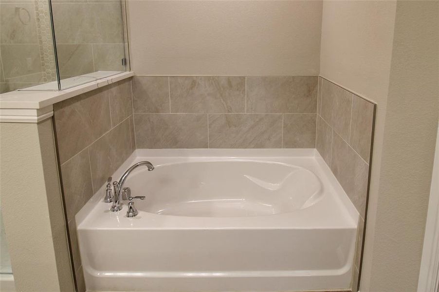 Bathroom featuring a garden tub
