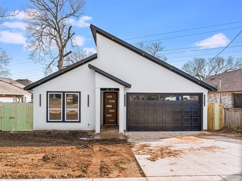 View of front of home with a garage